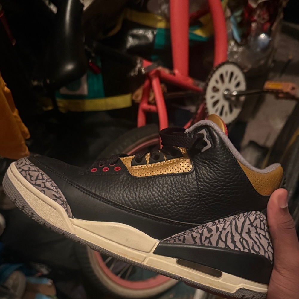 Jordan Black and Gold Sneakers